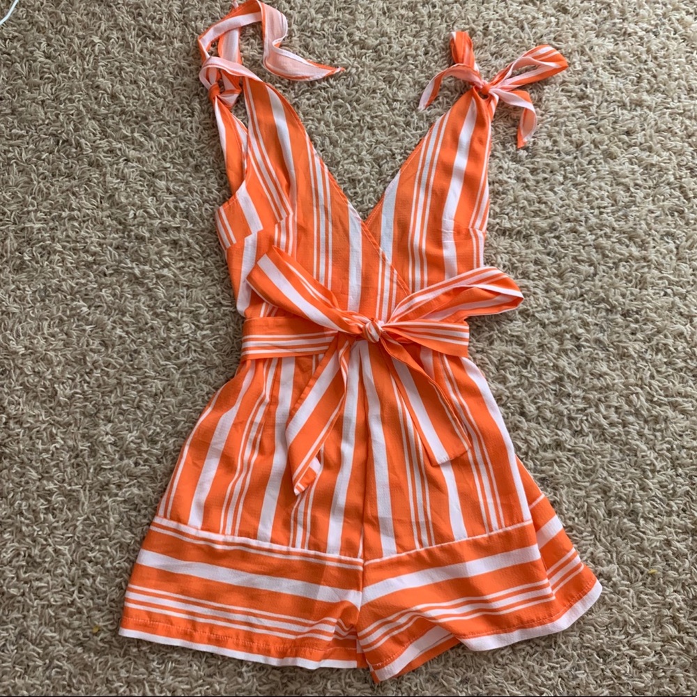 Orange striped romper with bow
